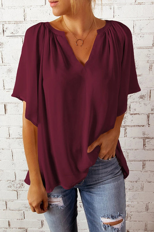 Flowy V-Neck Blouse With Gathered Shoulders And Flutter Sleeves