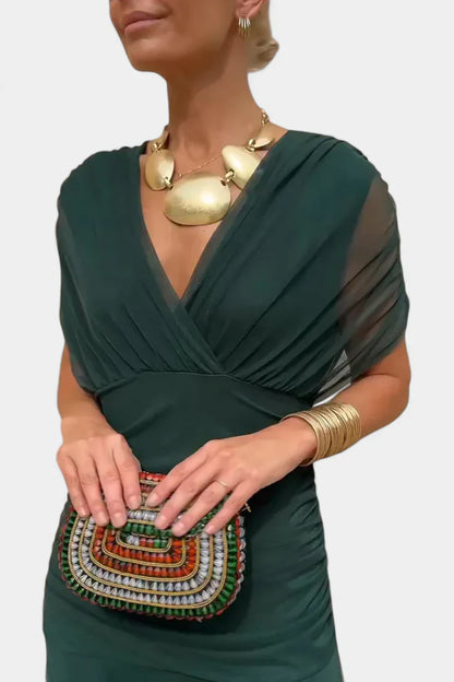 Elegant Off-Shoulder Ruched Evening Gown With Twist Front And Flowing Skirt